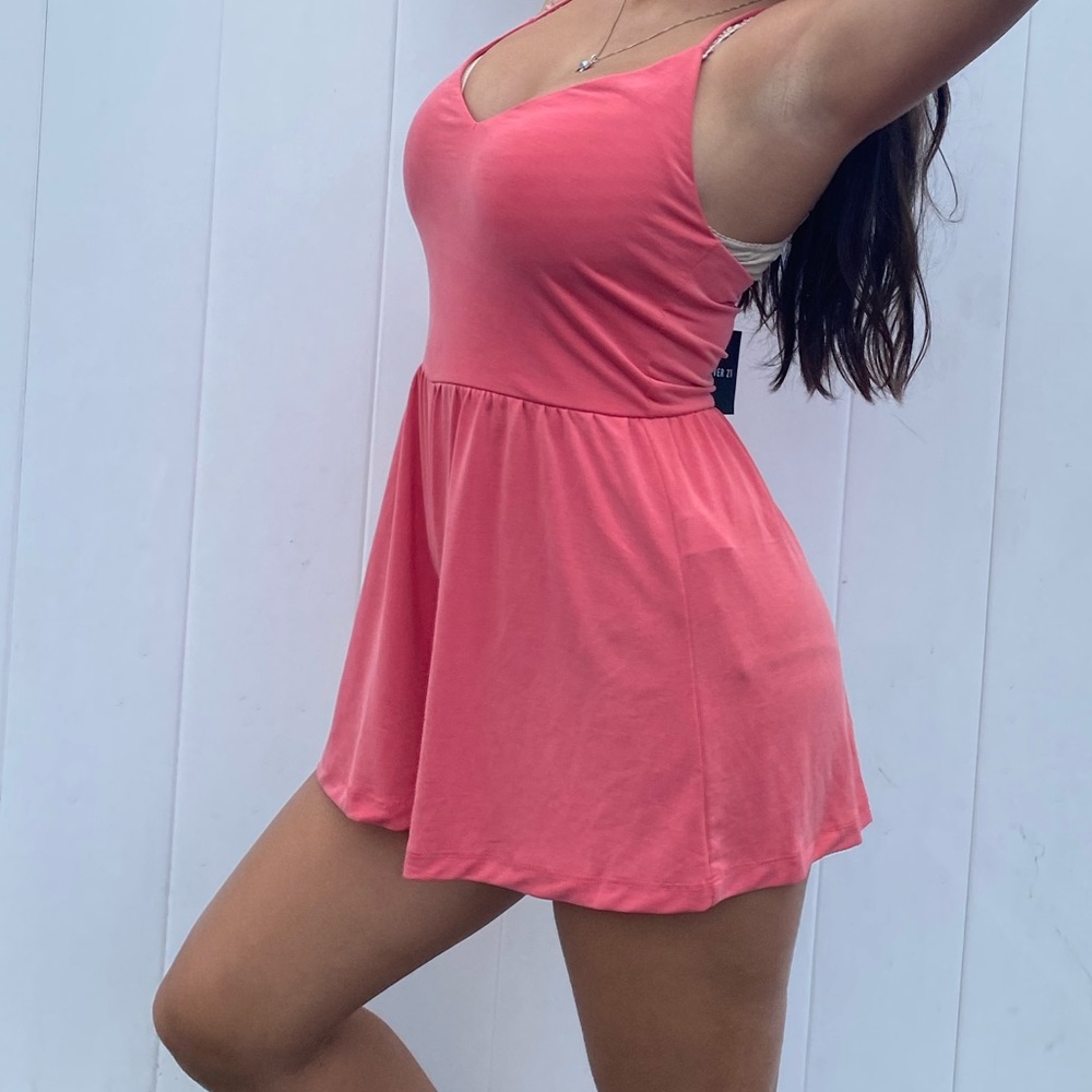 Pink romper still with tag